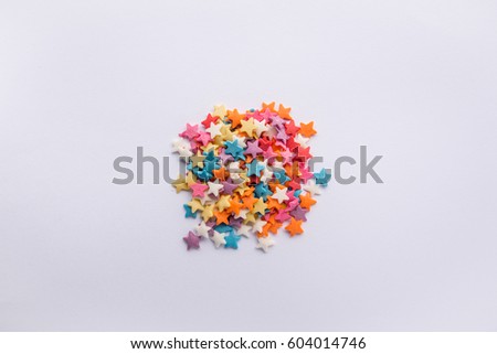Easter sugar powder in the form of multicolored stars.
