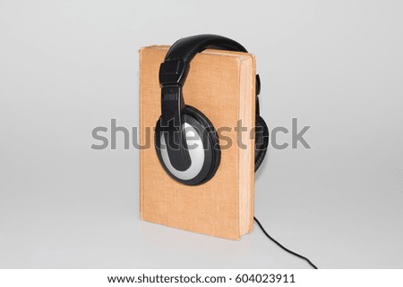 Book with headphones ebook reader listen