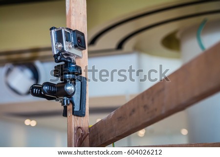 Action camera on an pole.