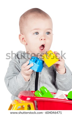 child playing with a toy truck on a white background