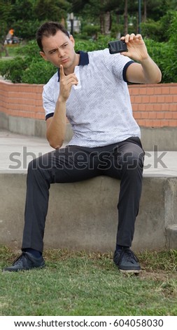 Man Posing For Selfie