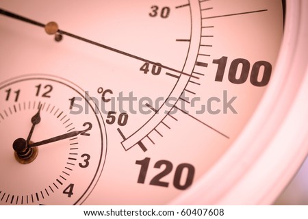 Colorized Round Outdoor Thermometer Showing Over 100 Degrees.