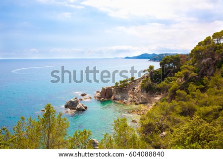 Panoramic picturesque sea landscape of the Lloret de Mar in summer. Beautiful aerial view of the bay of Lloret de Mar in Costa Brava, Catalonia, Spain. Colorful Horizontal Wallpaper
