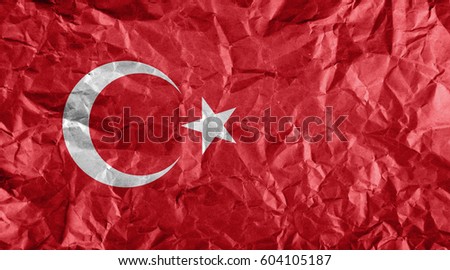 Turkey flag on natural crumpled parchment paper background