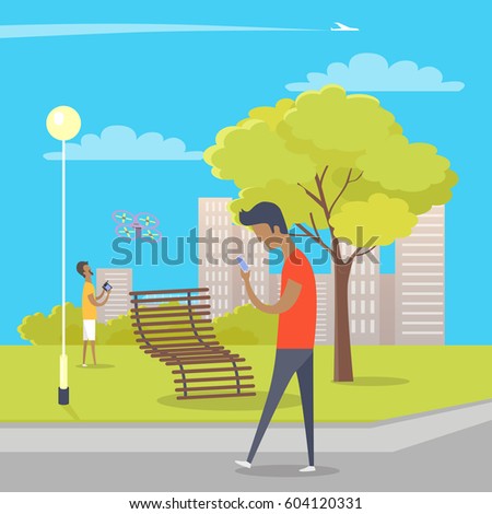 Boy looks at smartphone and walks in park where other guy plays with quadrocopter. Green tree, wooden bench near bushes, skyscrapers, streetlight in park and airplane crosses sky vector