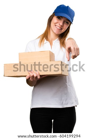 Delivery woman pointing to the front
