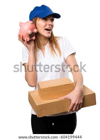 Surprised Delivery woman holding a piggybank