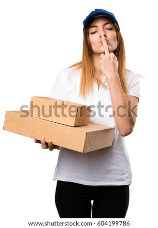 Delivery woman making horn gesture