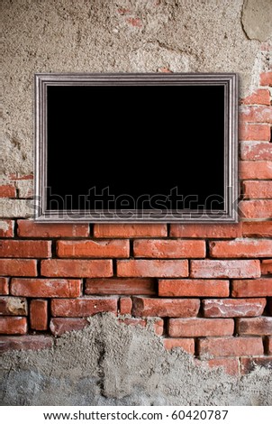 Silver frame on a old bricks wall background