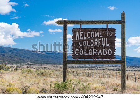 Welcome to colorful Colorado sign along the Colorado and Utah border.