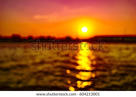 Beautiful sea wave and sky at sunset. Blurred background picture.