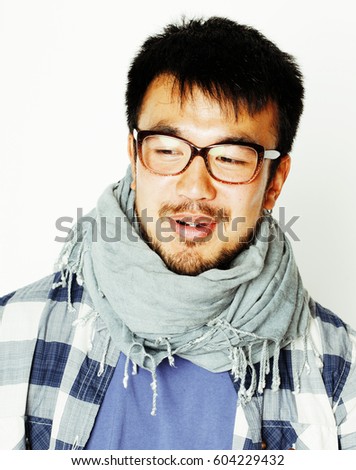 young handsome asian man hipster in glasses on white background,