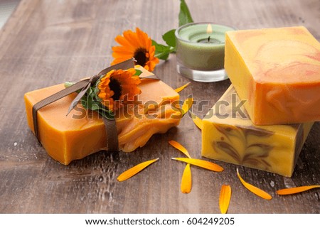 Spa set - handmade organic soap and fresh calendula. Best suited for relaxing and health commercials.
