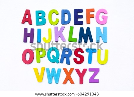 Group of English letters made by colorful wooden on white background. English language learning concept