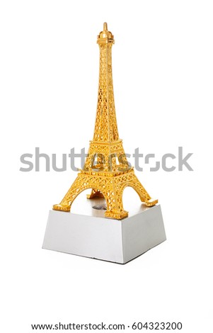 Eiffel tower statue. Paris tourism illustration. Beautiful metallic plastic souvenir statue.  Colorful illustration of french tourism or any other concept. Yellow gold golden.