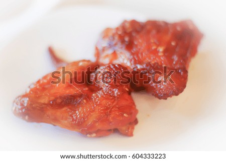 Picture blurred abstract background of grilled chicken
