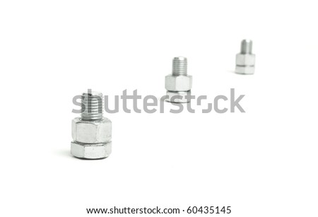 Abstract image of nuts and bolts isolated on white background.