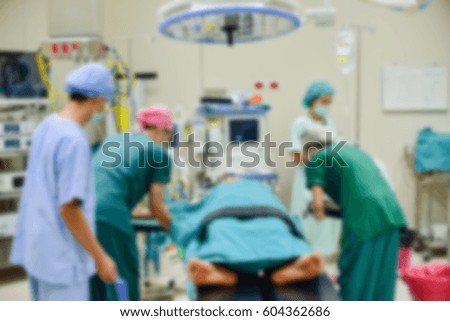Blurred of patient and teamwork in operating room