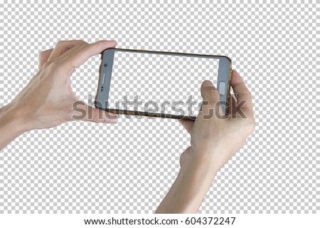 Taking photo with mobile smart phone isolated on transparent background with clipping path for the screen. Royalty-Free Stock Photo #604372247