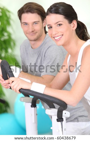 Man and woman doing sports
