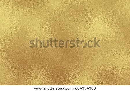Golden color foil, metal, texture.