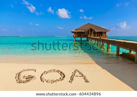 Word Goa on beach - nature holiday background