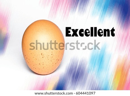 conceptual image of egg and word-Excellent with abstract colour as background