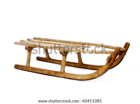 Old vintage wooden sled on white