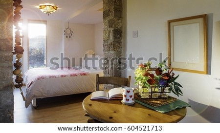 Interior shot of a bed and breakfast room.