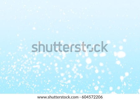Abstract blue background with white round  bokeh or glitter lights background. Circles and defocused particles