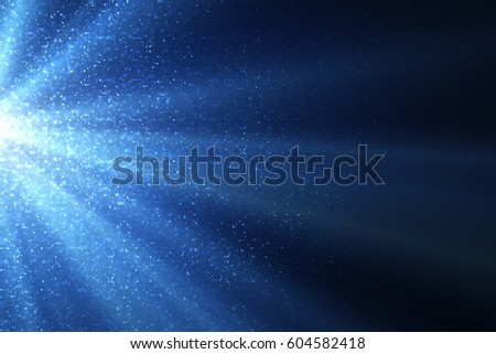 Blue abstract sparkles or glitter lights. Festive background. Defocused circles bokeh or particles. Template for design