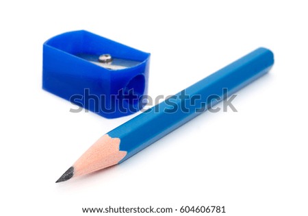 A blue pencil with sharpener isolated on white.