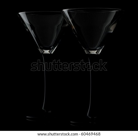 Martini glass on a black background