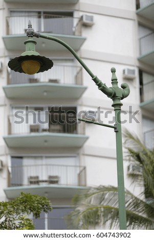 Stock photo of a historic style street lamp in Waikiki Beach Honolulu Hawaii