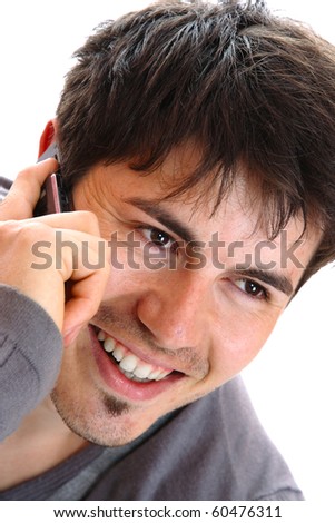 Young casual man on the phone isolated over white background