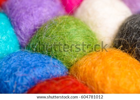 color wool background - balls of synthetic wool yarn - geometric rainbow pattern Royalty-Free Stock Photo #604781012