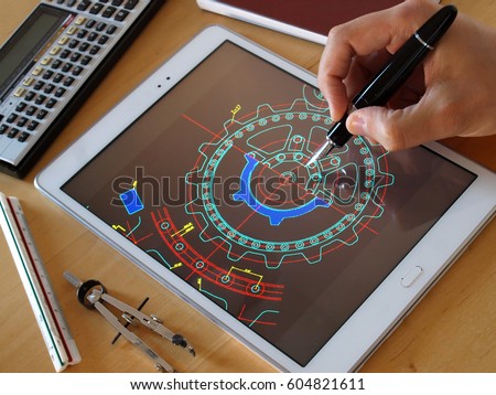 engineer designer working on cad blueprint using tablet computer tool     