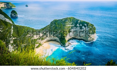 Manta Bay or Kelingking Beach on Nusa Penida Island, Bali, Indonesia Royalty-Free Stock Photo #604840202