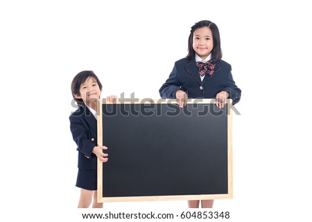 Asian children with black board on white background isolated
