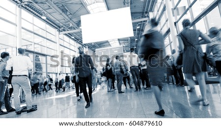 Abstract Image of Business People Walking on a trade fair