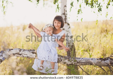girl with her mom on picnic