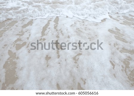 soft wave of the sea on the sandy beach