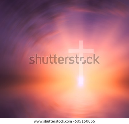 Religious cross against the background of the rays of the setting sun, symbolizing "faith". Abstract religious composition