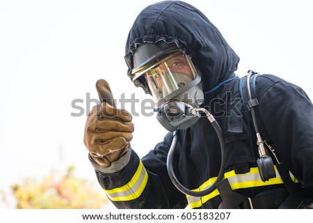 Firefighters, Fireman Like this human hand with thumb up Royalty-Free Stock Photo #605183207