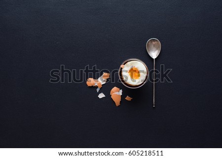 Served Table Boiled Egg Support Teaspoon Shell Top View Minimal Picture on Black Vintage Table Background Minimalism Style