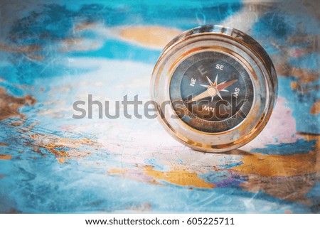 compass on map background travel. pointer. selective focus. 