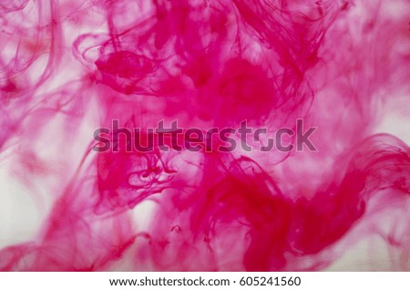 pink paint dissolves in water