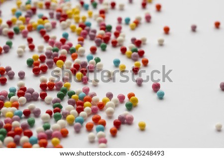 Colorful confectionery balls on a white background