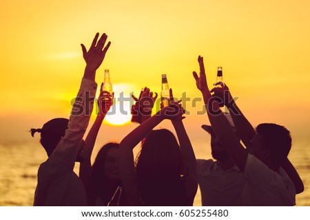 Friends Beach Party Drinks Toast Celebration Concept Royalty-Free Stock Photo #605255480