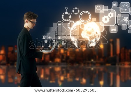 Side view of young businessman using laptop with digital financial charts, icons and globe. Blurry night city background. Online business concept. 3D Rendering